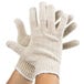 A pair of large Cordova jersey gloves with a white knit material.