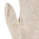 A pair of beige Cordova jersey work gloves with a thumb.