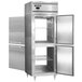 The white door of a stainless steel Continental half door pass-through refrigerator.