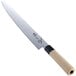 A Mercer Culinary sashimi knife with a white handle and white blade on a counter.