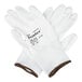 A pair of white Cordova Halo HPPE and synthetic fiber gloves with a white polyurethane palm coating and brown trim, size medium.