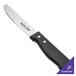 A Walco stainless steel steak knife with a black handle.