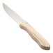 A Walco stainless steel steak knife with a jumbo wood handle.