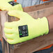 A close-up of a pair of Cordova yellow work gloves with yellow polyurethane palms.