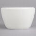 A white Villeroy & Boch porcelain covered sugar holder on a gray surface.