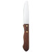 A Walco stainless steel steak knife with a dark hardwood handle.