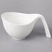 A white Villeroy & Boch porcelain bowl with a curved handle.