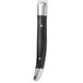 A close-up of a Walco stainless steel steak knife with a black plastic handle.