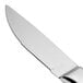 A close-up of a Walco stainless steel steak knife with a jumbo mirror finished hollow handle.