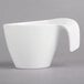 A Villeroy & Boch white porcelain cup with a handle.