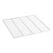 A white metal grid shelf with holes.