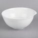 A white Villeroy & Boch porcelain salad bowl with a handle.