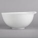 A white Villeroy & Boch salad bowl on a gray background.