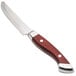 A Walco Denver steak knife with a wooden handle.