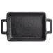 A black rectangular cast iron casserole dish with a handle.