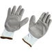 A pair of Cordova grey and white gloves with white palms.