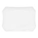 A bright white rectangular china platter with a curved edge.