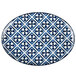 An Arcoroc Candour Azure porcelain oval platter with a blue and white cross pattern.