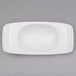 A white rectangular bowl with a small rim.