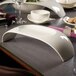 A white plate with a Villeroy & Boch white porcelain bowl on top of it.