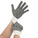 A pair of Cordova warehouse gloves with black PVC dots on a white background.