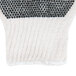 A close-up of Cordova polyester and cotton work gloves with black PVC dots on a white background.