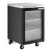 A black counter height back bar refrigerator with a glass door and caster wheels.