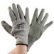 A pair of Cordova Cor-Grip II gloves with grey crinkle latex palms on a white background.