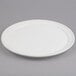 An American Metalcraft white ceramic pizza serving tray on a gray surface.