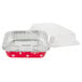 A Durable Packaging aluminum foil cake pan with a clear plastic lid.