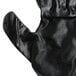 A pair of gray Cordova warehouse gloves with black nitrile palm coating.