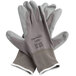 A pair of gray Cordova Cor-Touch Lite gloves with gray polyurethane palms.