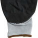 A pair of black and grey Cordova Cor-Touch foam gloves with black foam nitrile palm coating.