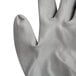 A close-up of Cordova gray polyester gloves with gray polyurethane palm coating.