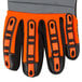 A Cordova Colossus Hi-Vis orange warehouse glove with black and gray accents.