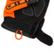 A pair of medium Cordova Colossus orange and black gloves with black synthetic leather palms and TPR protectors.