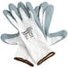 A pair of white Cordova Cor-Touch gloves with gray foam nitrile palms on a white background.