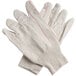 A pair of white Cordova nap-in work gloves with red stitching.