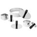 A stainless steel Matfer ring mold pack down tool with a black handle.