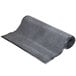 A charcoal Cactus Mat with a curved edge.