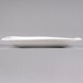 A CAC white rectangular porcelain plate.