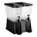 A double 3-gallon beverage or juice dispenser with a black stand and two spigots.