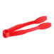 A red plastic tongs with a flat grip.