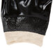 A pair of black Cordova warehouse gloves with black and white interlock lining.