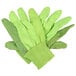 A pack of Cordova lime green canvas work gloves with black dots.