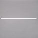 An Avantco T8 fluorescent light tube with white ends on a gray background.