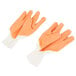 A pair of large orange Cordova Ruffian gloves with white jersey lining on a white background.