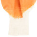 A close-up of an orange and white knitted fabric.