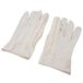 A pair of Cordova white polyester/cotton work gloves with red stitching.