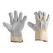 A pair of Cordova white canvas work gloves with leather palms and rubber cuffs on a white background.